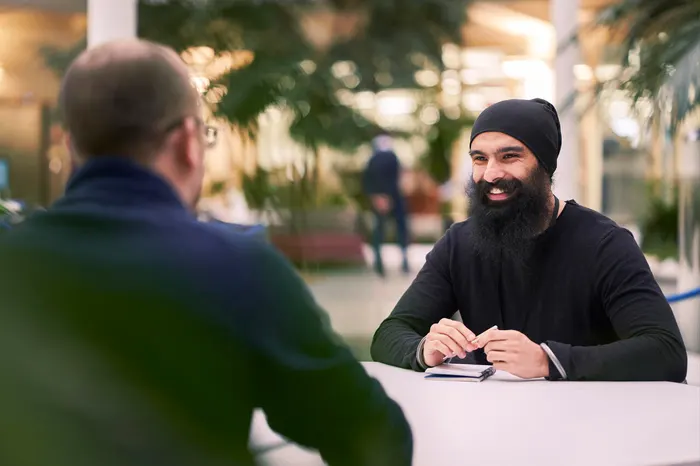 two men talking